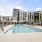 Pool with apartment in background