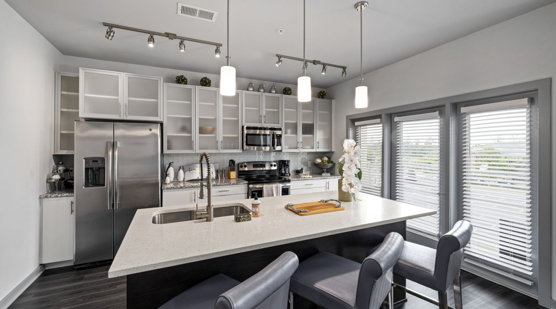 Upscale kitchen with stainless steel appliances at District Lofts luxury apartments in Morrisville, NC Upscale kitchen with stainless steel appliances at District Lofts luxury apartments in Morrisville, NC