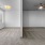 Large well lit bedroom with plush carpets and large windows 