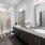 Large well lit bathroom with white accents 