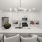 Spacious and well lit kitchen with wood flooring and stainless steel appliances