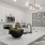 Spacious and well lit kitchen with wood flooring and stainless steel appliances