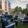 Seating area by pool during sunset