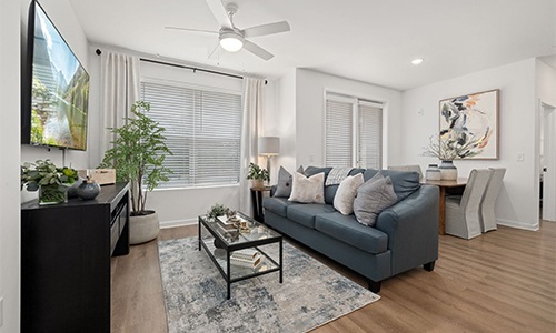 Comfortable living room at District Square apartment rentals in Morrisville