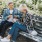 a couple of women sitting on a bench
